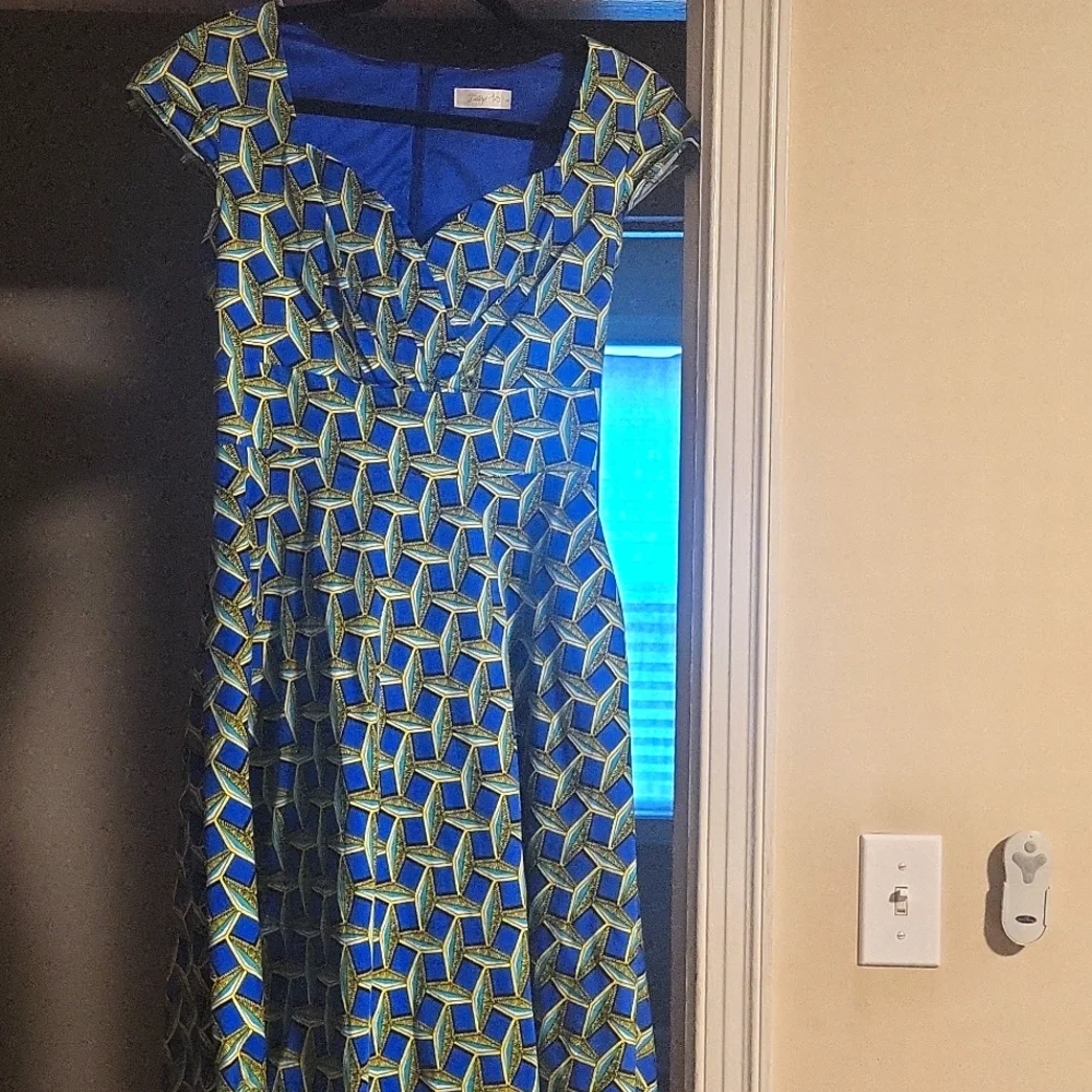 A patterned blue, turquoise, yellow & black dress. - Picture 1 of 5